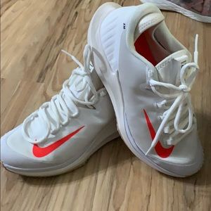 Nike zoom court zero tennis shoes.